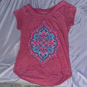 This shirt is from Lucky Brand and was brought years ago.